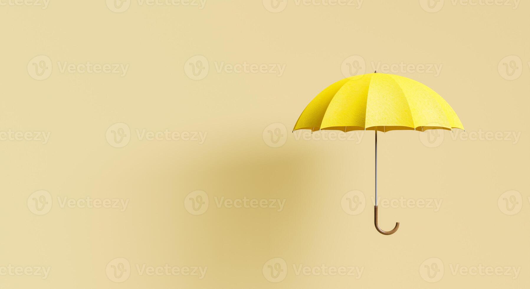 gelber Regenschirm auf beigem Hintergrund mit Schatten foto