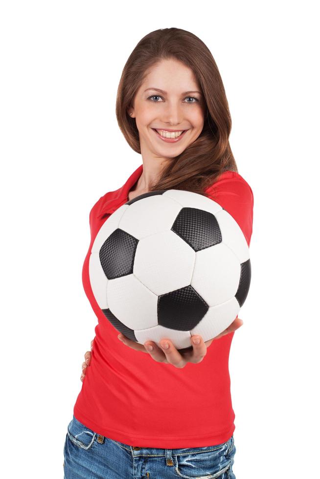 Mädchen mit einem Fußball in der Hand foto