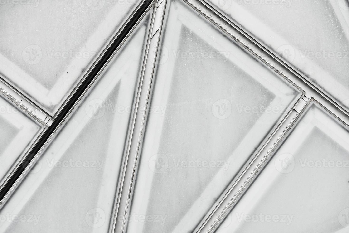 strukturiertes silbernes Metall und abstraktes Hintergrunddetail aus Glas foto