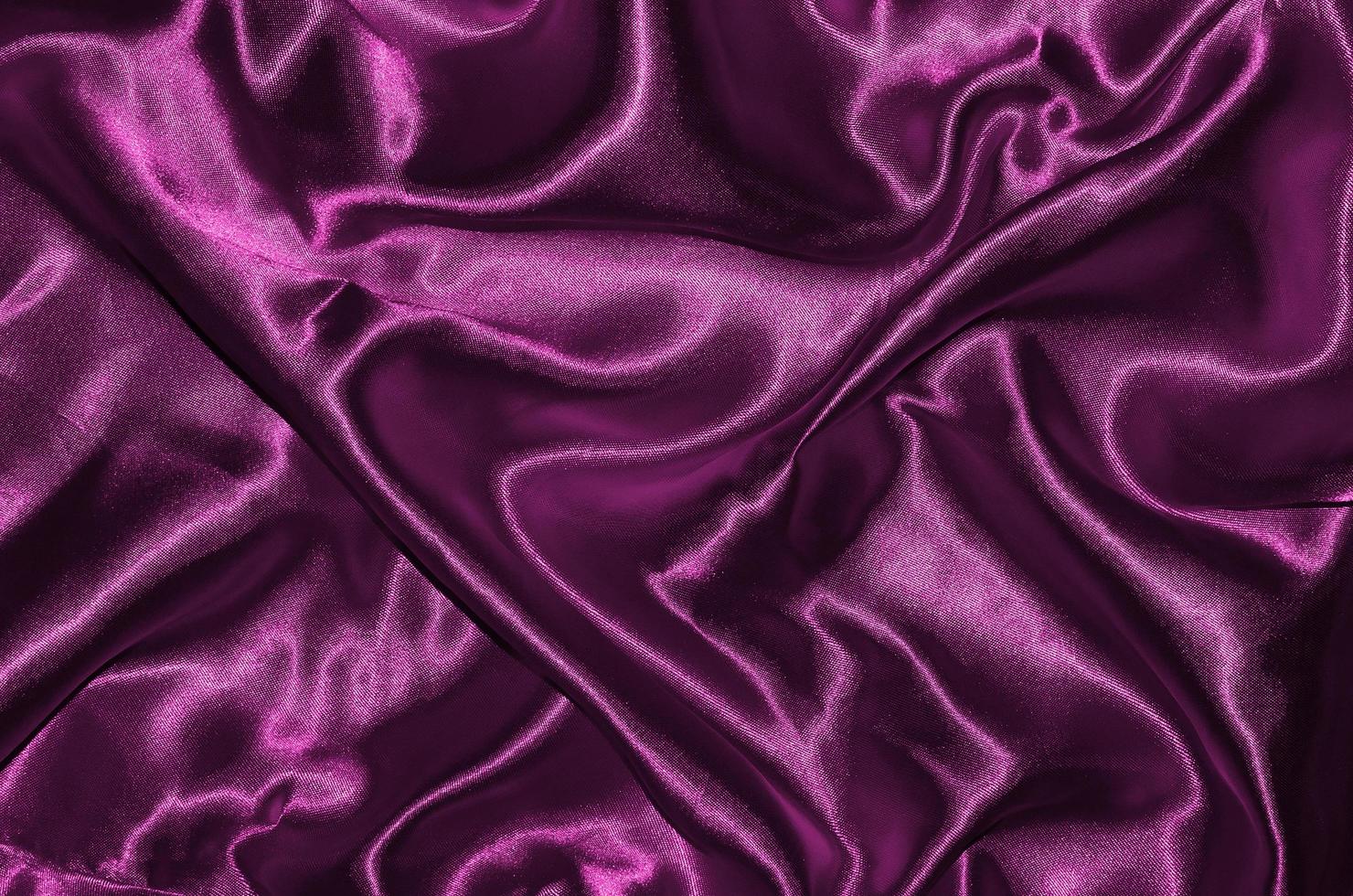 Hintergrund und Tapete aus rosa Stoff und gestreiftem Textil foto