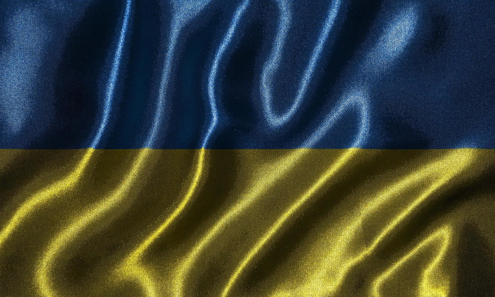 Tapete von ukrainischer Flagge und wehende Flagge von Stoff. foto