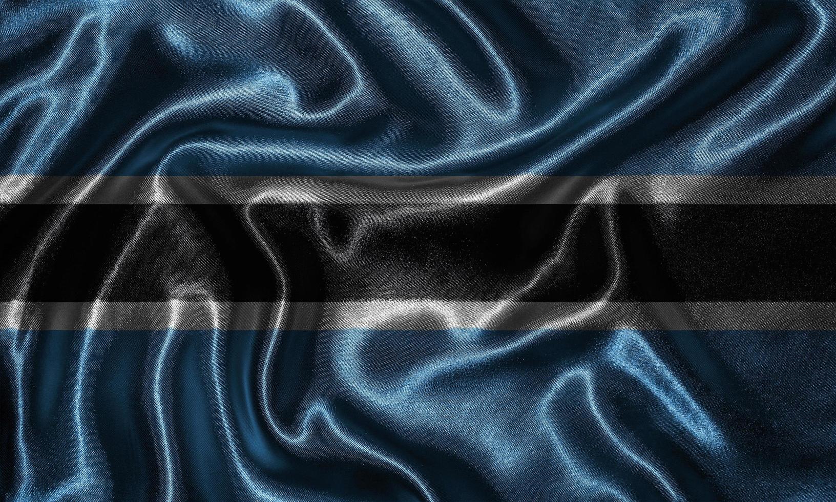 Tapete von Botswana-Flagge und wehende Flagge von Stoff. foto