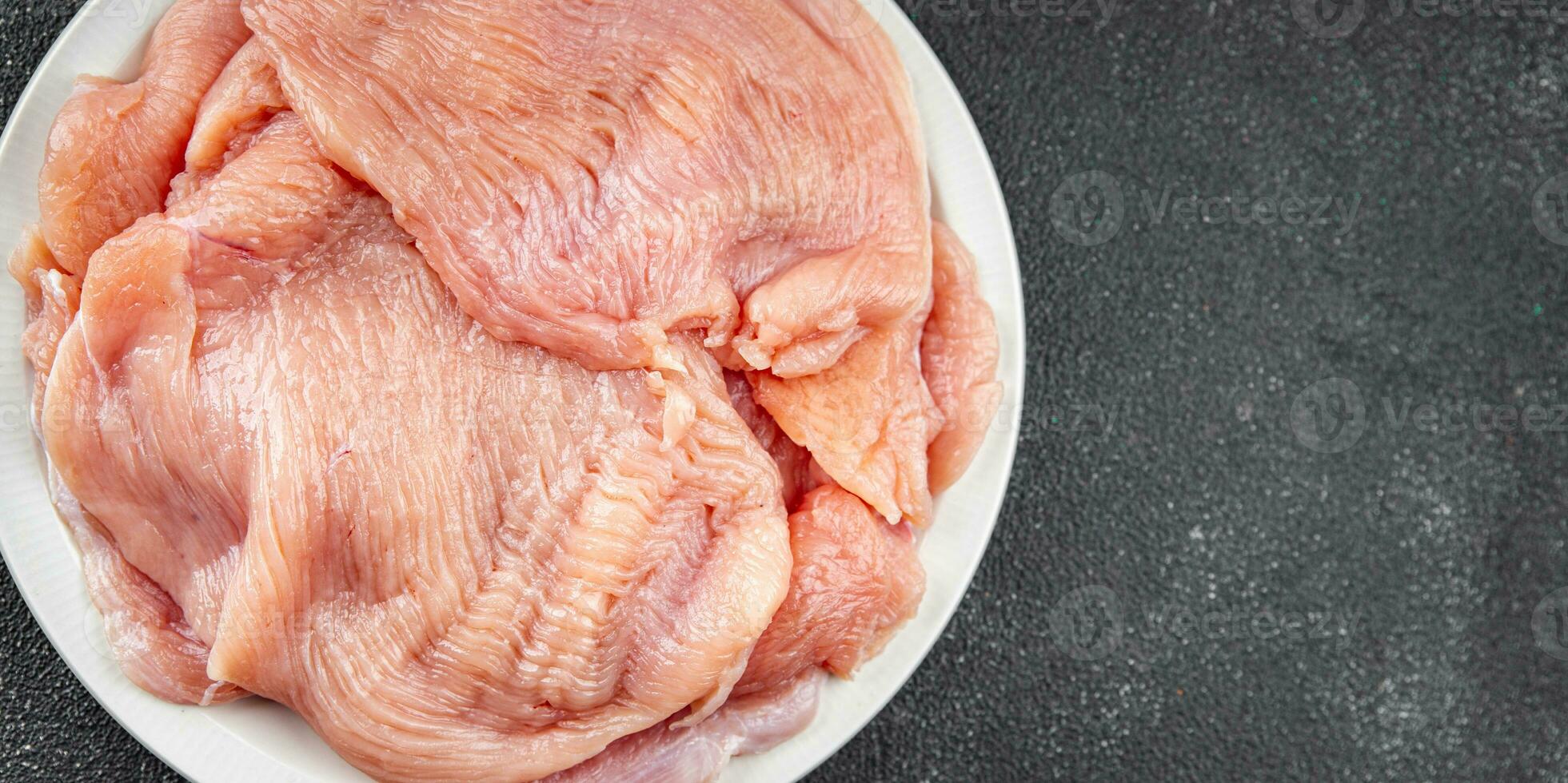 roh Truthahn Filet Scheibe frisch Geflügel Fleisch Kochen Mahlzeit Essen Snack auf das Tabelle Kopieren Raum Essen Hintergrund rustikal oben Aussicht foto