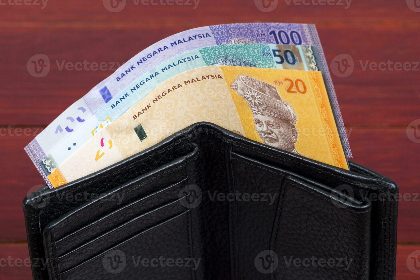 malaysisch Geld im das schwarz Brieftasche foto