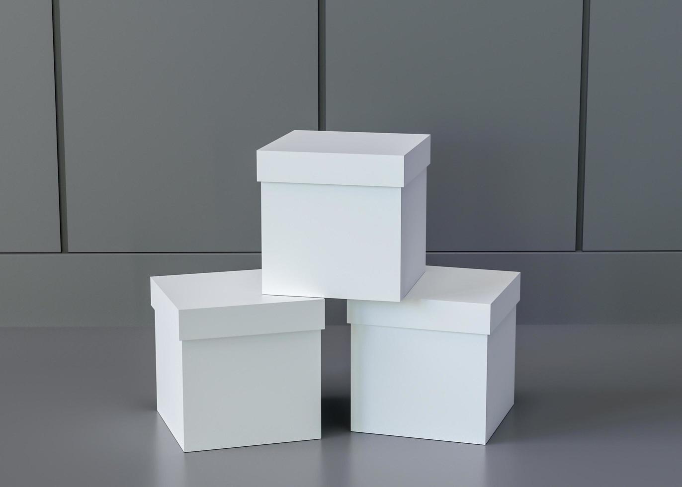 3 Boxen in Reihe im Raum aufgestellt, Farbe Marine foto
