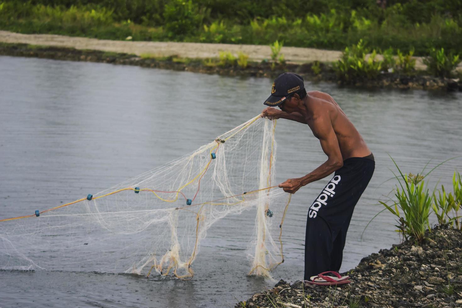 Sorong, Indonesien 2021- Teichfischer foto