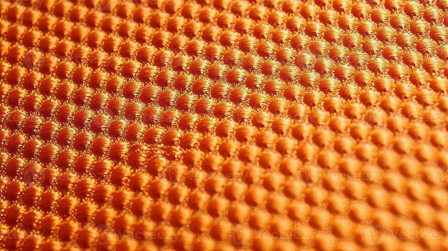 Orange Fußball Stoff Textur mit Luft Gittergewebe. Sportbekleidung Hintergrund foto