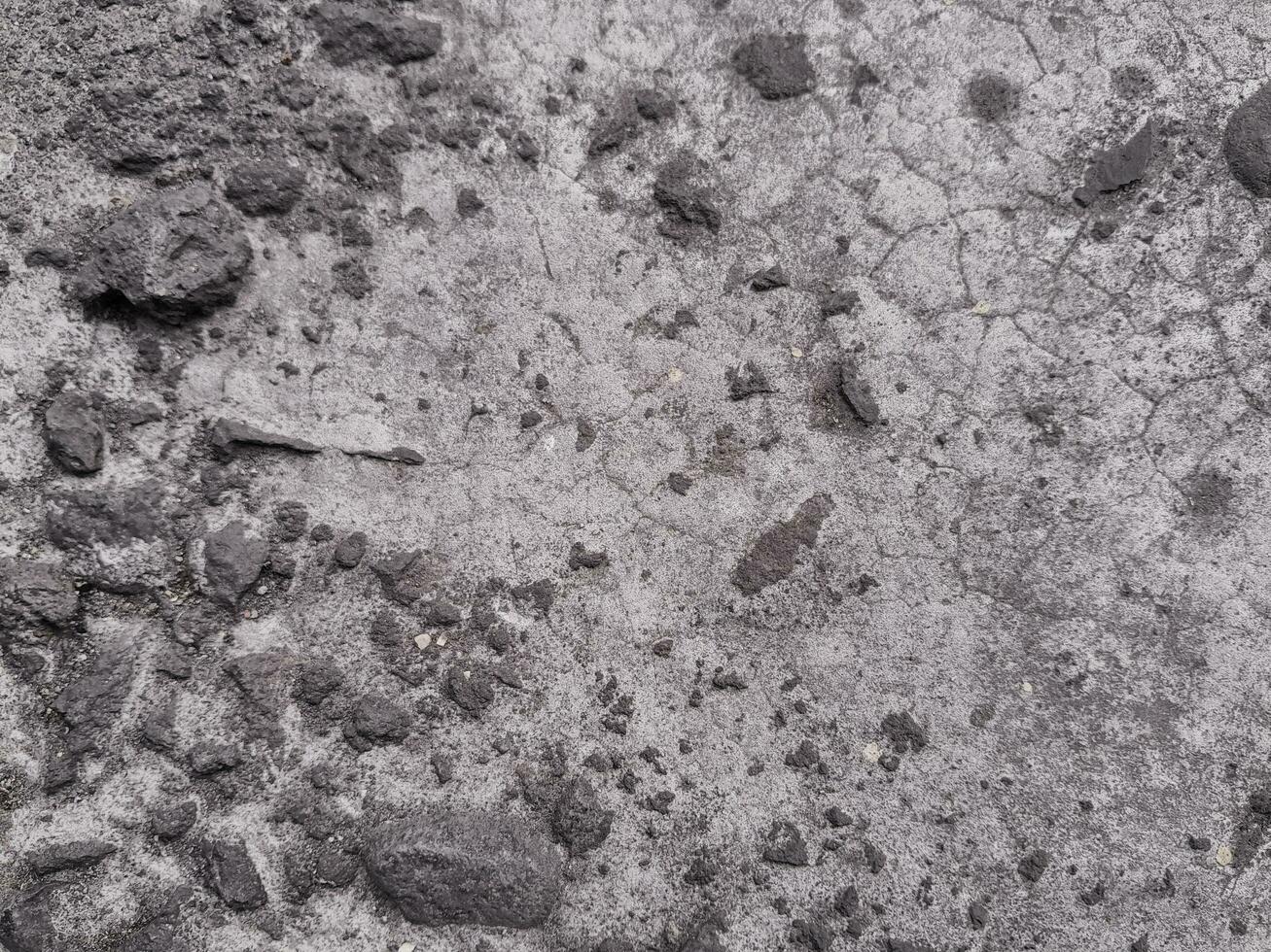 grungy Mauer von grau Beton Textur mit geknackt Oberfläche von Sand und Zement Materialien. foto