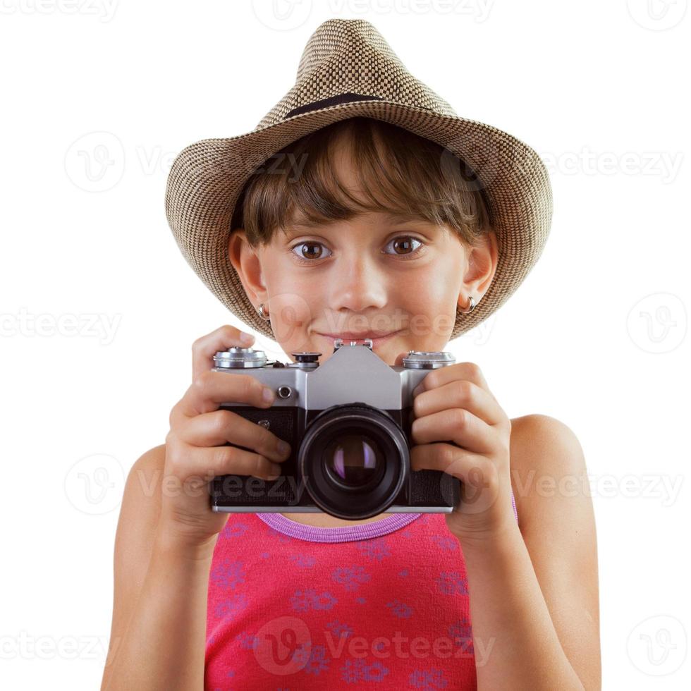 glückliches Mädchen mit einer Filmkamera foto