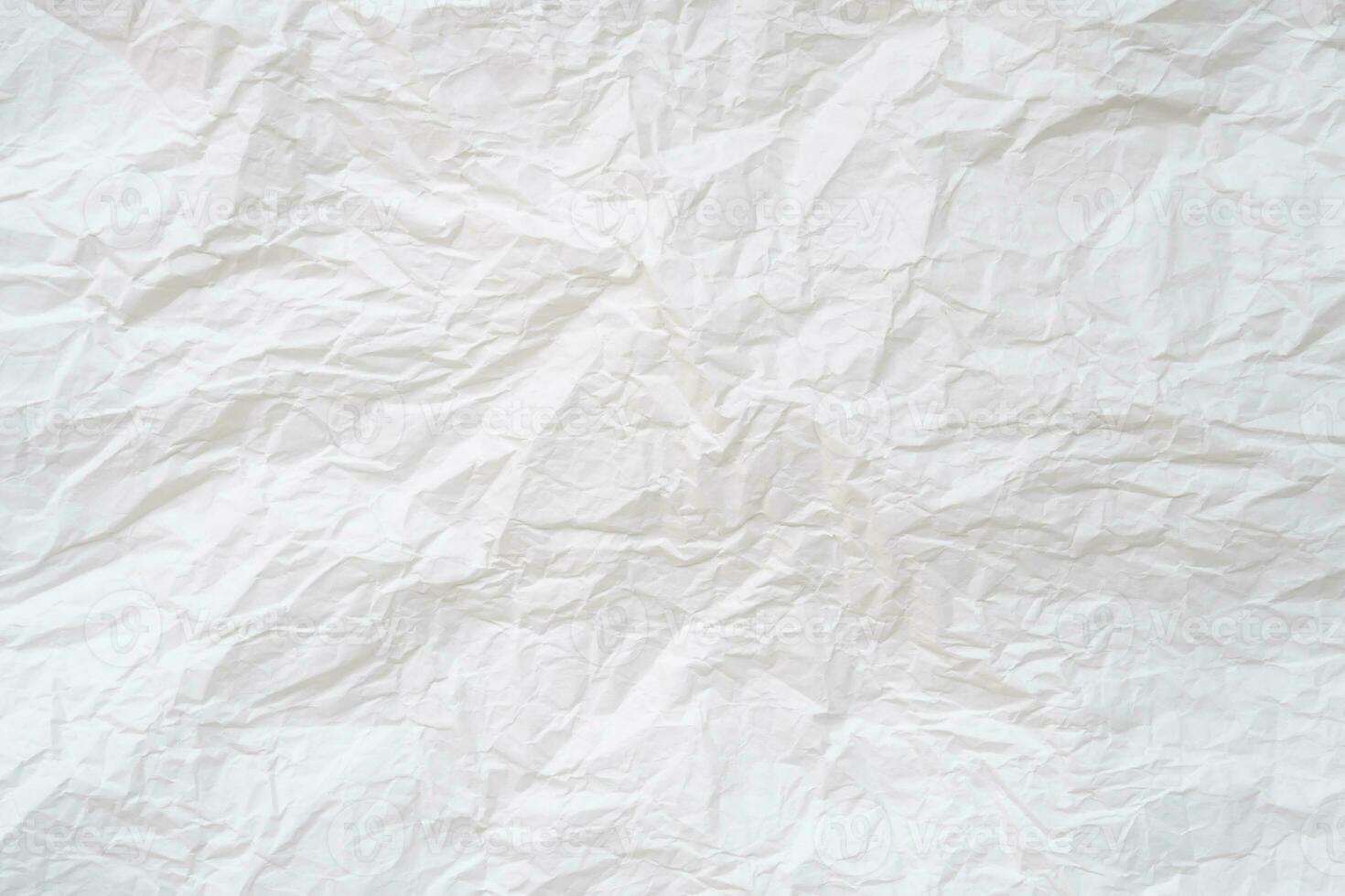 zerknittertes oder zerknittertes weißes Schablonenpapier, das für die Hintergrundtextur verwendet wird foto
