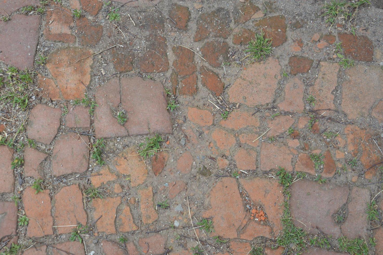 Textur des alten Mauerwerks auf der Straße foto