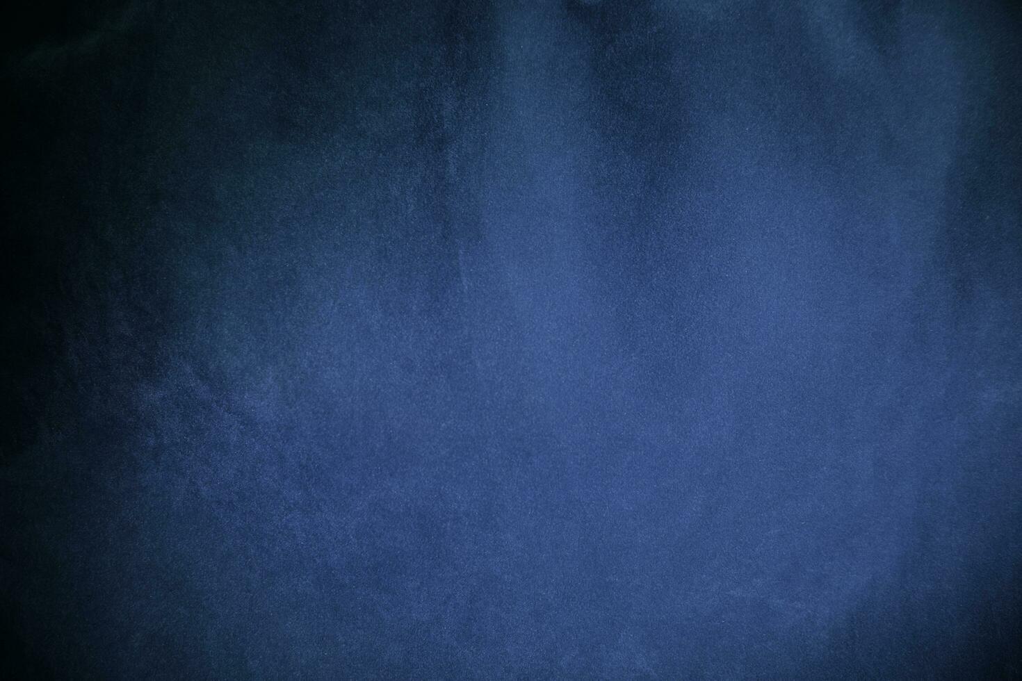 Blau Samt Sanft Rau Textil- Material Hintergrund Textur schließen Auf, Schürhaken Tischtennis Kugel, Tisch Tuch. leeren Marine Blau Stoff Denim Hintergrund. foto