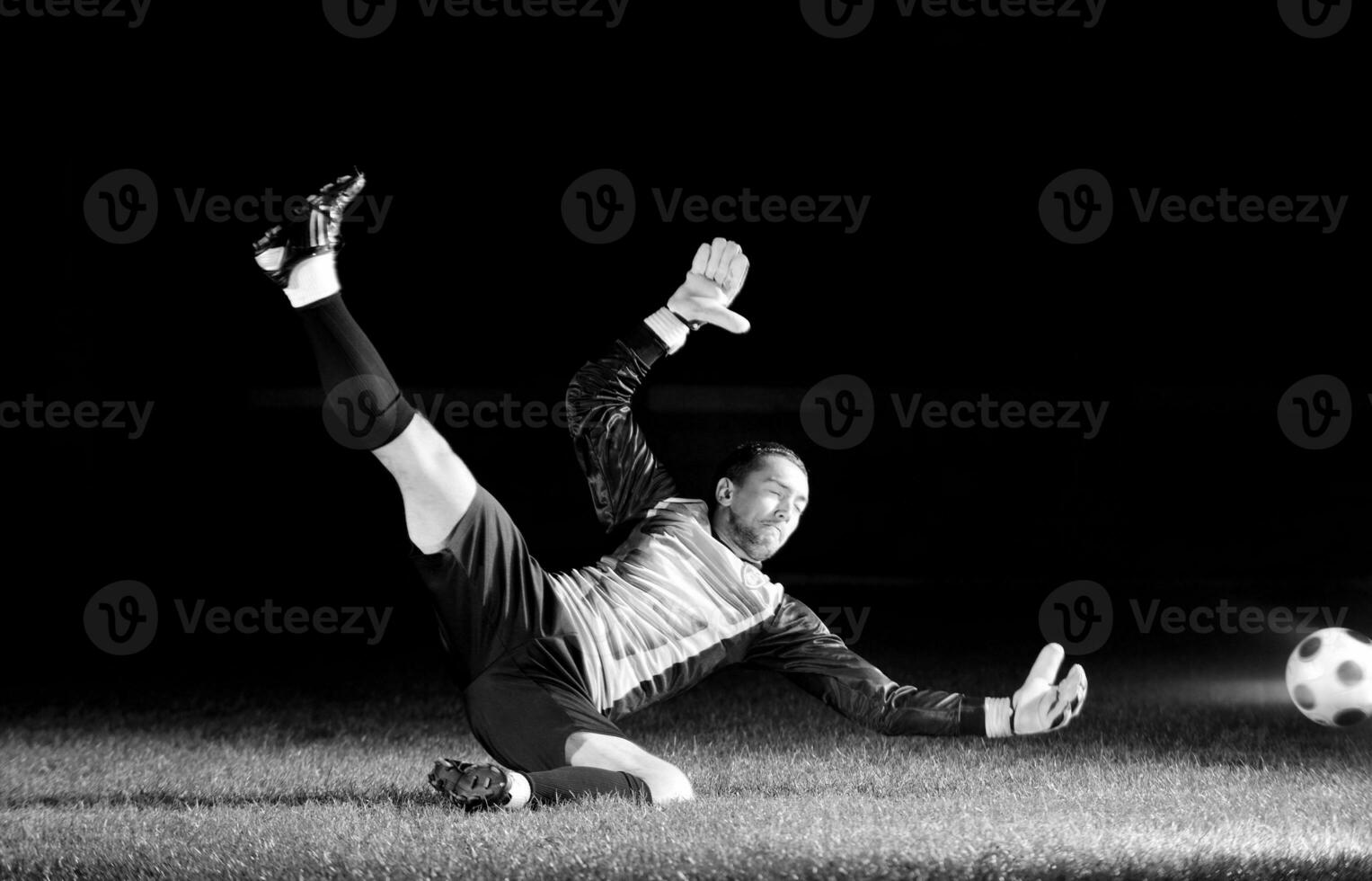 Mann, der Fußball spielt foto