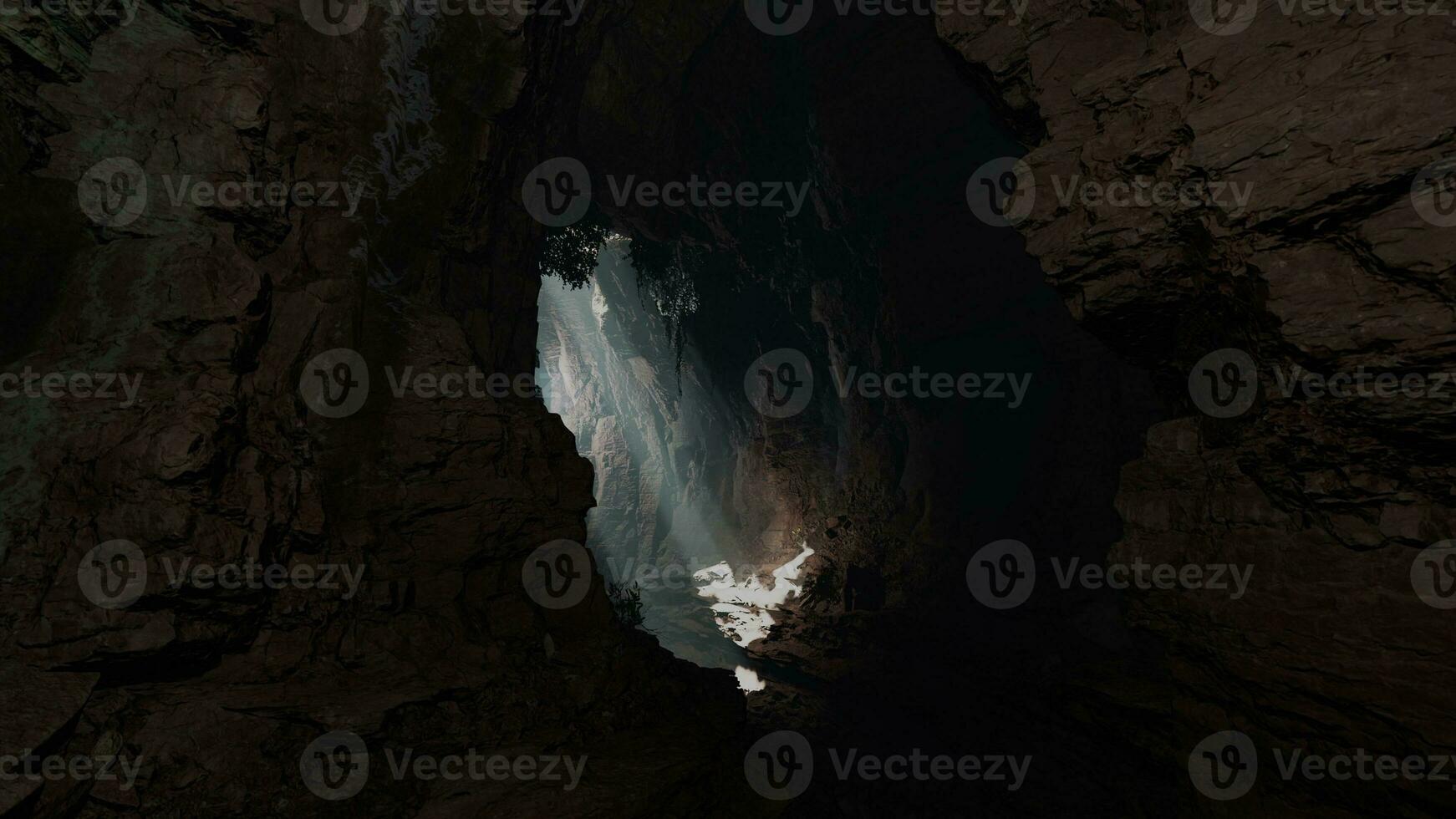 ein Höhle mit ein atemberaubend Strahl von Licht leuchtenden durch ein groß Loch im das Decke foto