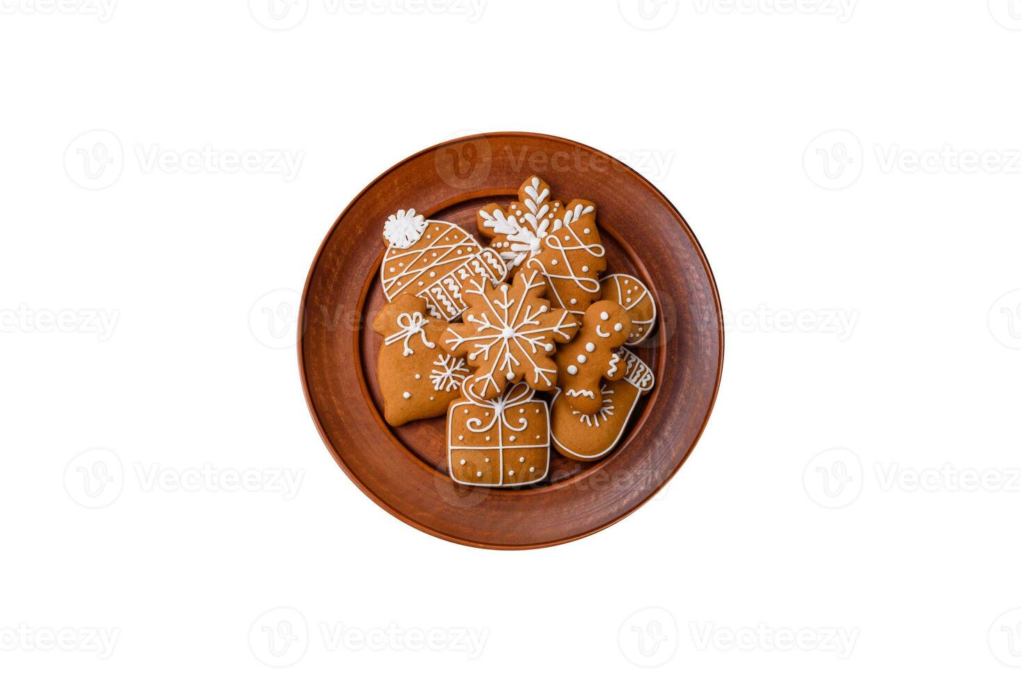 schön köstlich Süss Winter Weihnachten Lebkuchen Kekse auf ein Bronze- texturiert Hintergrund foto