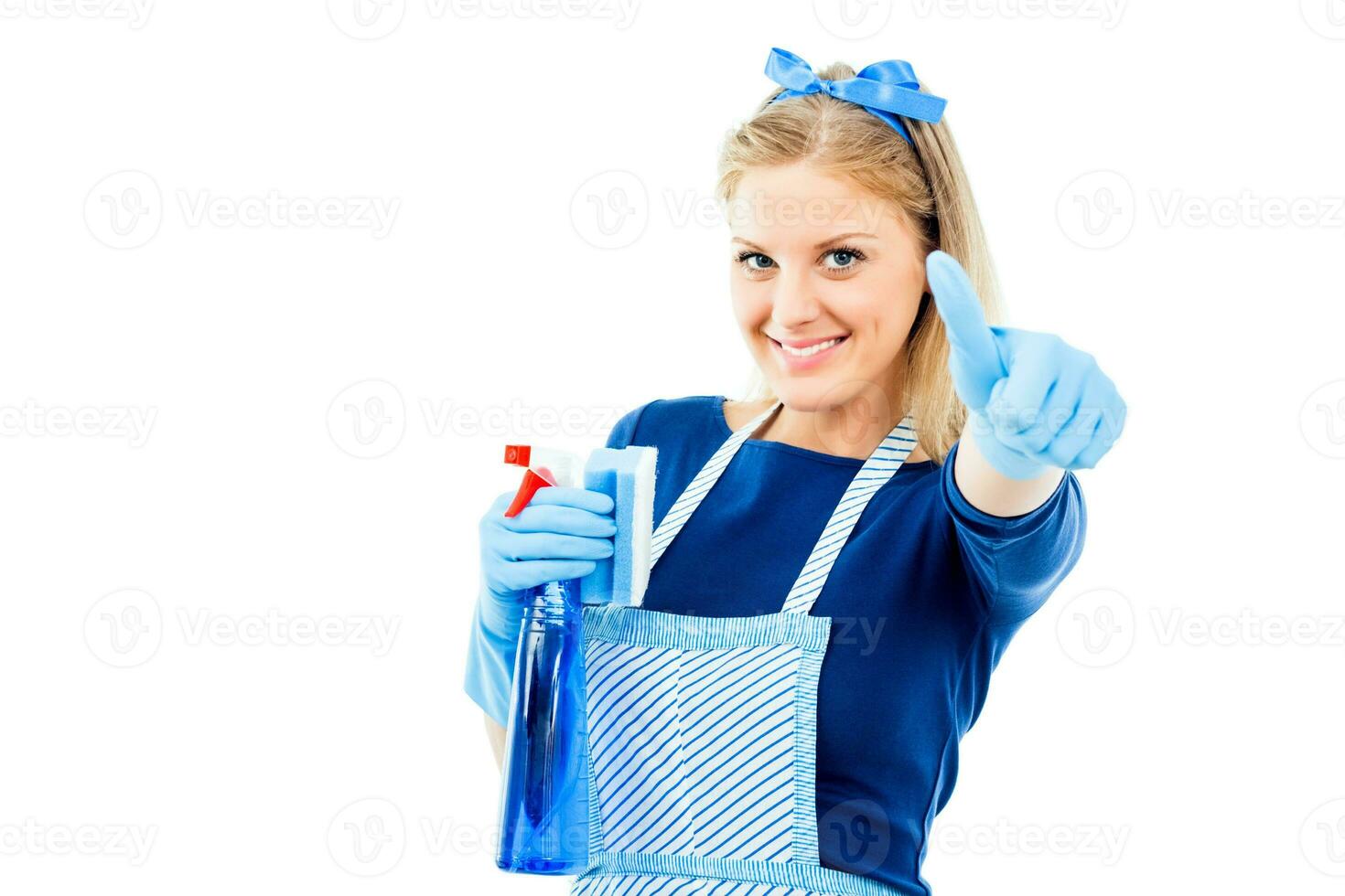 süß Hausfrau Reinigung und zeigen Daumen oben foto
