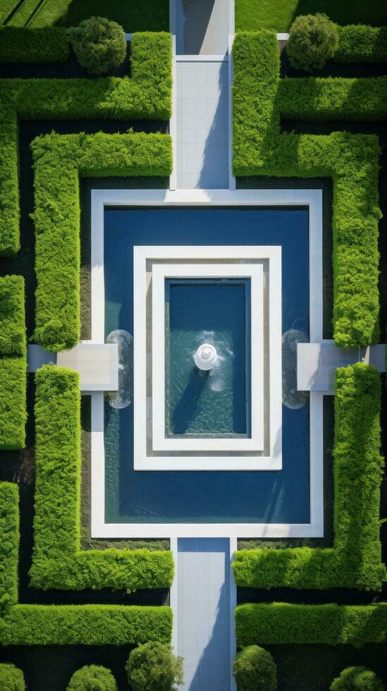 ai generiert ein atemberaubend Antenne Schuss von ein modern Garten Design mit ein geometrisch Muster von Hecken. foto