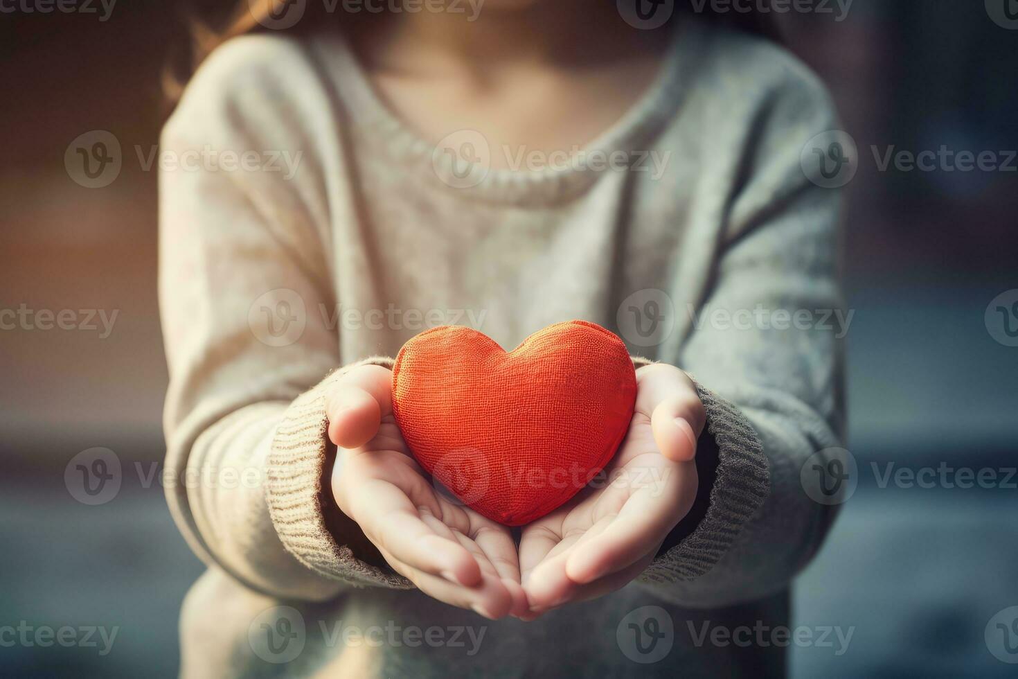 ai generiert schließen oben von Kind Hände halten ein rot Herz. ein Mädchen mit ein rot Herz, Mutter Tag. foto