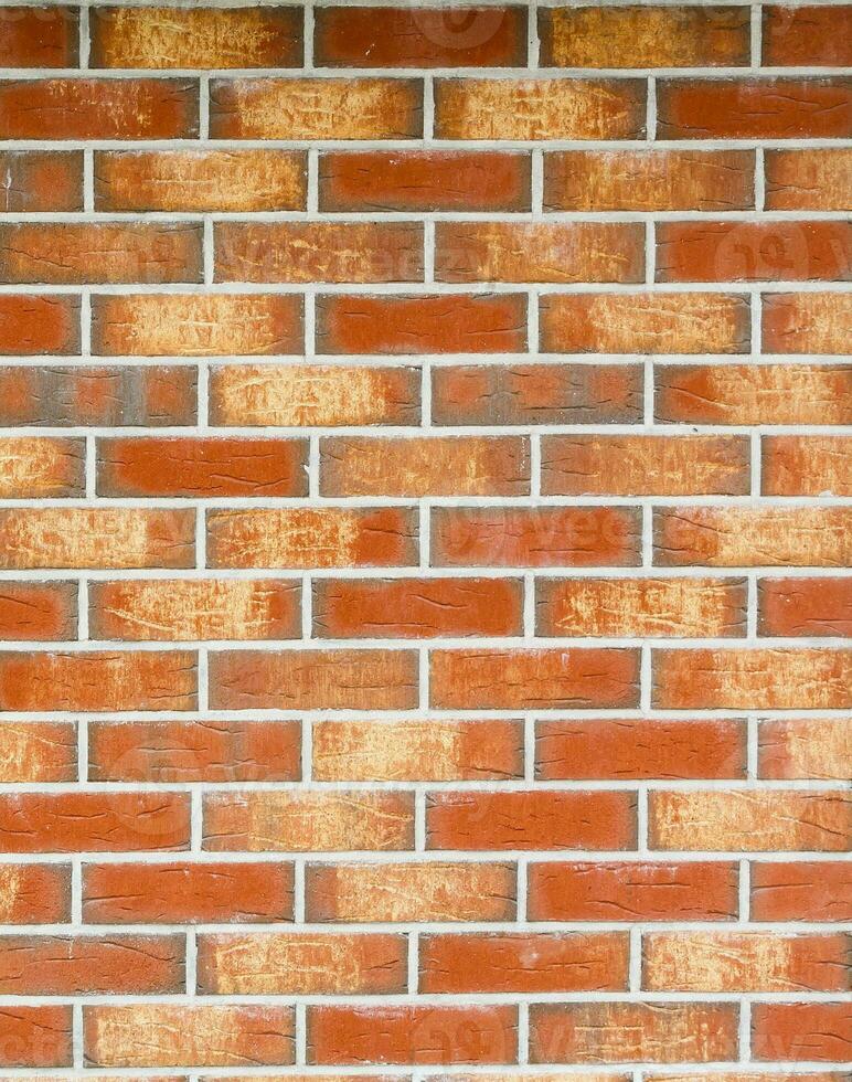 Red Brick Wall Textur Grunge-Hintergrund mit vignettierten Ecken, kann für die Innenarchitektur verwendet werden foto