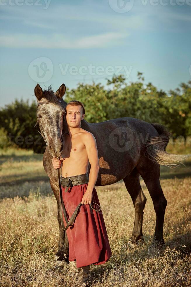 Kosaken und seine Pferd. Ukraine. zaporozhye sech. foto