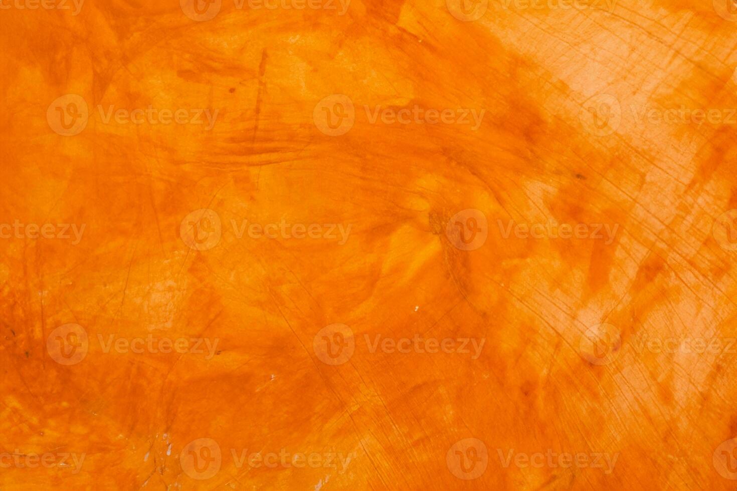 texturiert Mauer gebürstet gemalt Hintergrund, abstrakt Orange Öl Farbe. foto