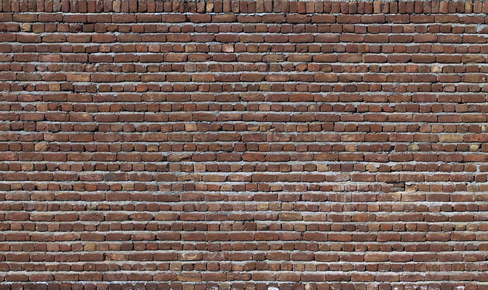 rote Backsteinmauer Nahaufnahme Hintergrund foto