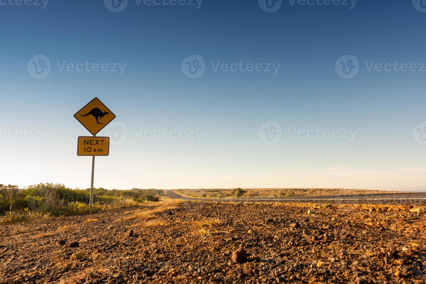 Känguru überqueren Straßenschild foto