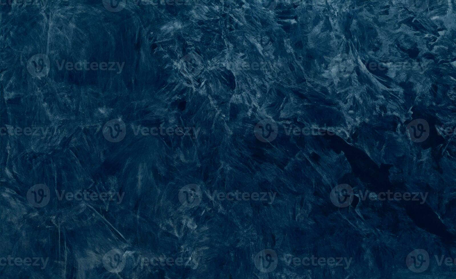 schöner abstrakter grunge dekorativer marineblauer dunkler Stuckwandhintergrund. foto