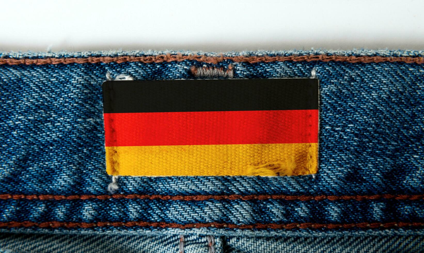 Flagge auf das Etikette von das Jeans foto