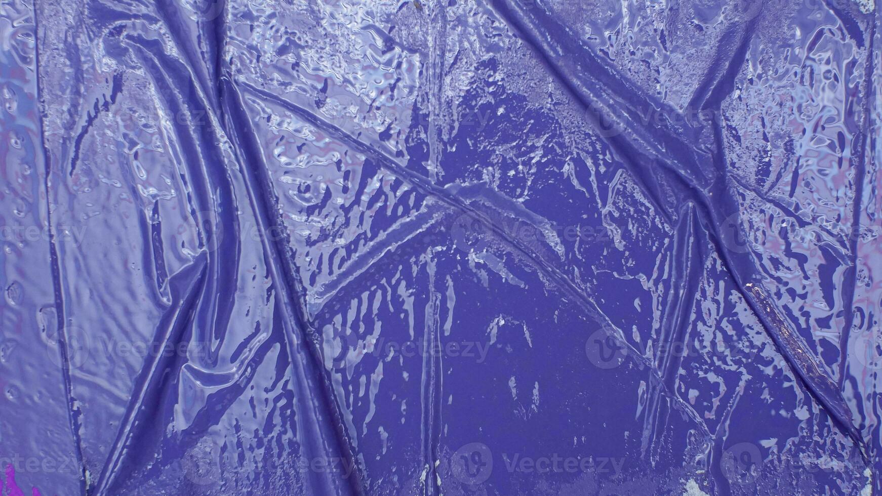 glänzend Blau Plastik mit Falten und Weiß Streifen foto