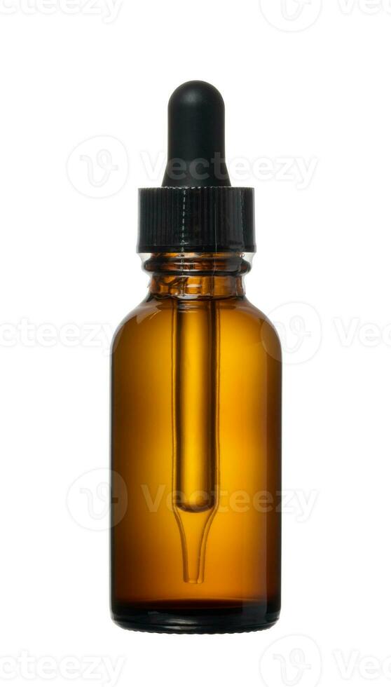 braun Glas Flasche mit Pipette zum Kosmetika und Öle auf isoliert Hintergrund foto