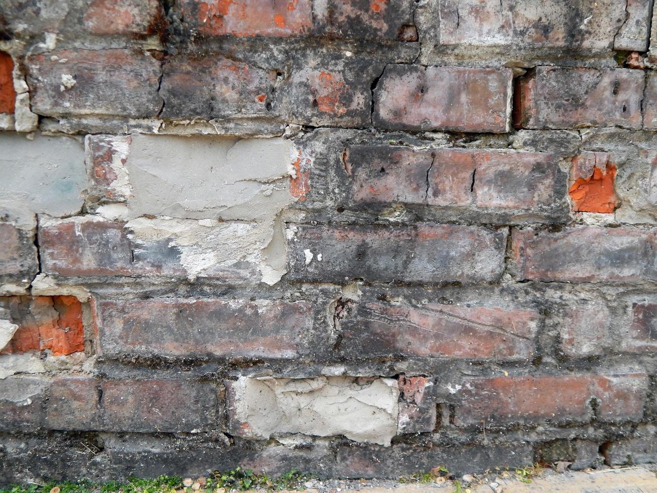 Textur von Natursteinmaterial und Ziegelmauerwerk foto