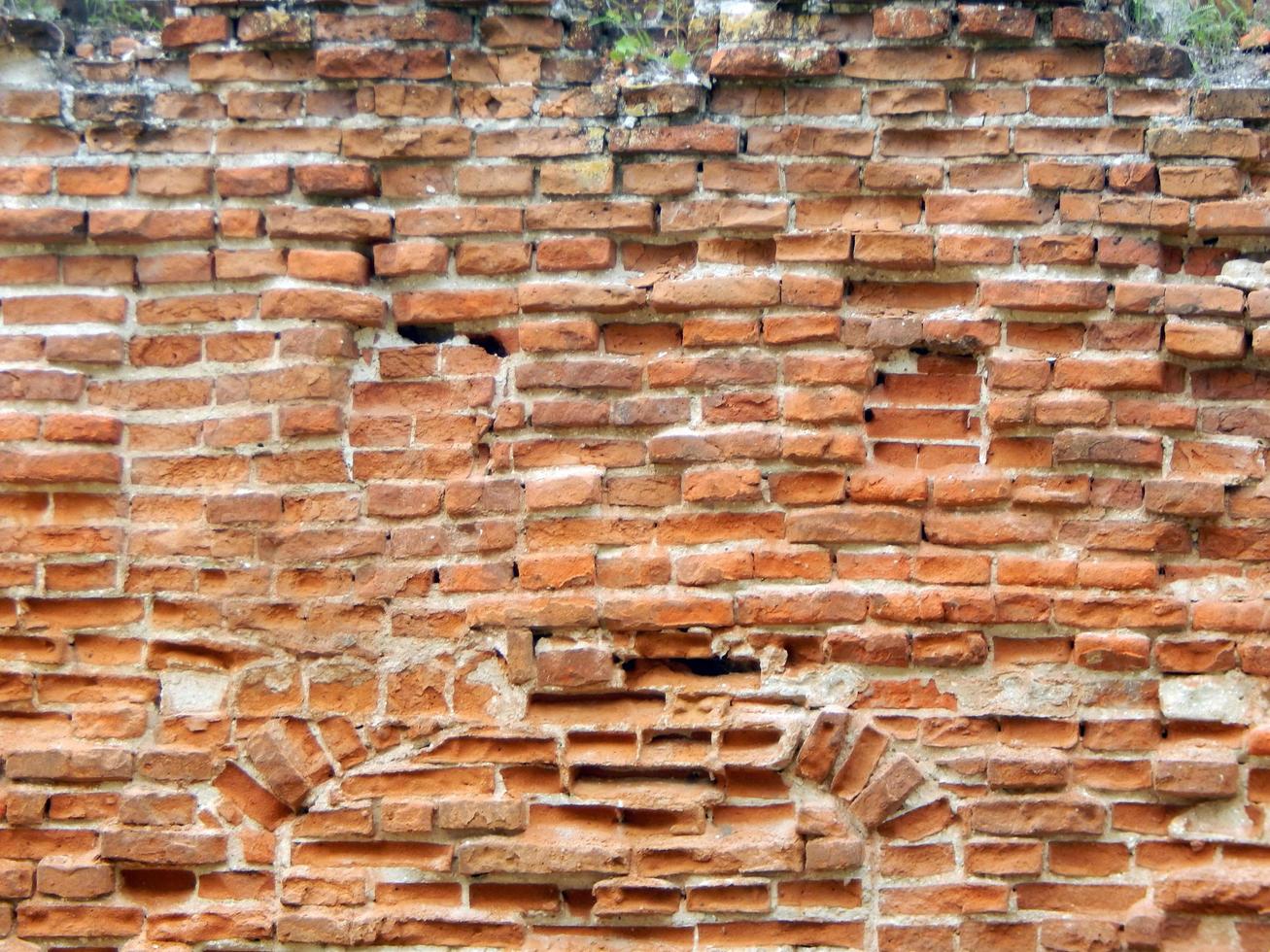 Textur von Natursteinmaterial und Ziegelmauerwerk foto