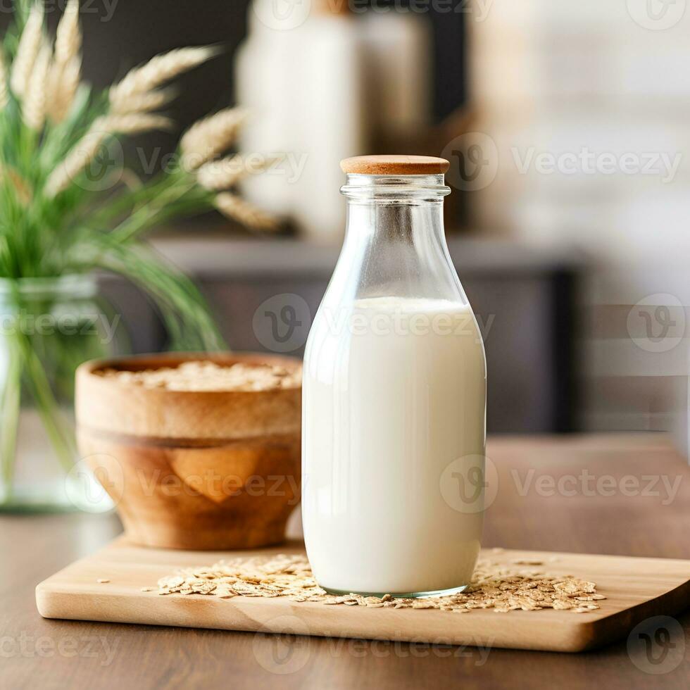 Flasche von Zuhause Kochen Hafer Milch auf Tische. foto