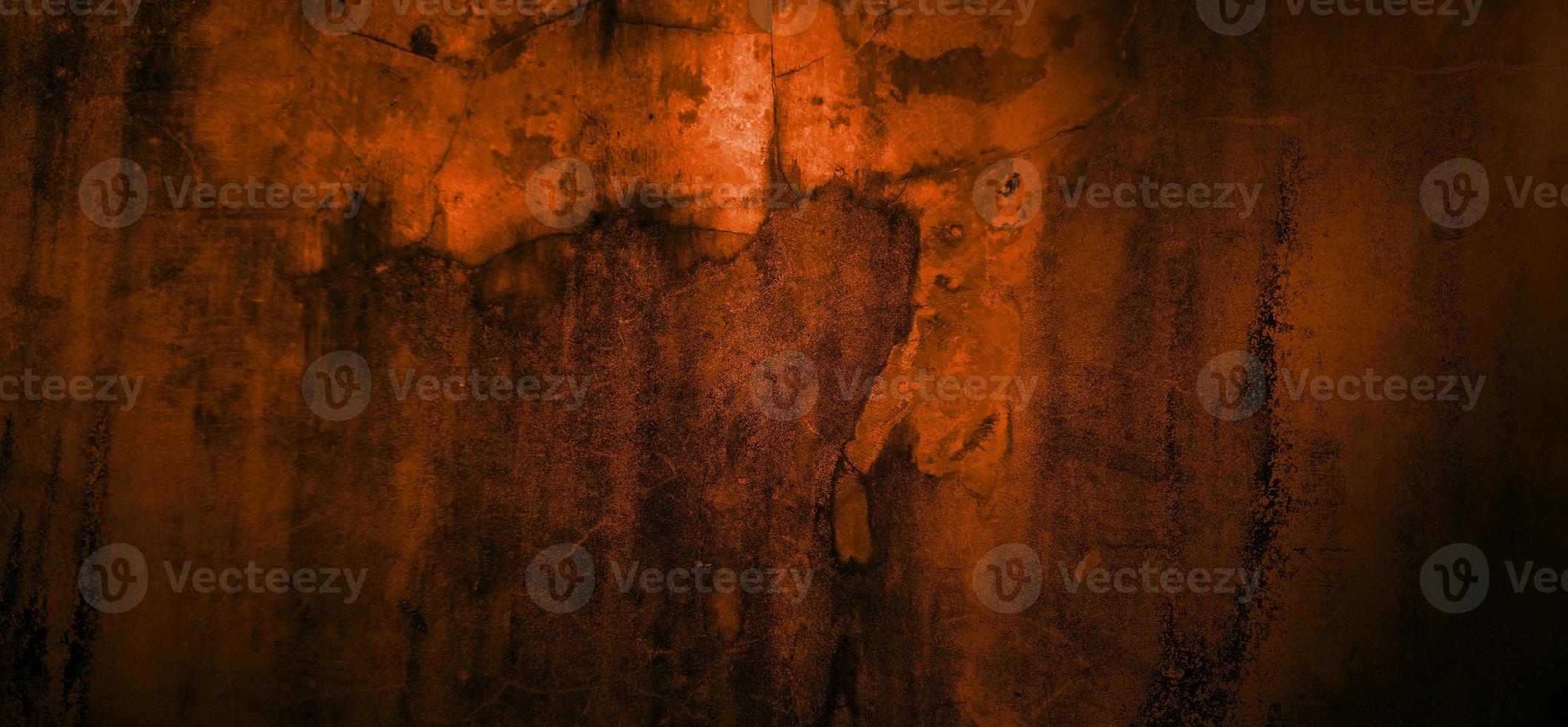 orange Wand mit dunklen Schatten. dunkelorangefarbener Zement für den Hintergrund foto