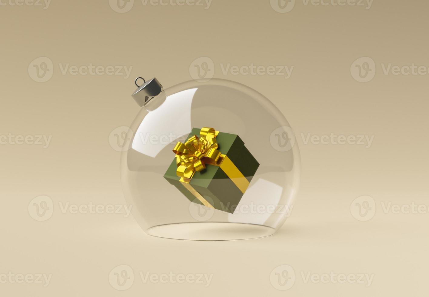 Weihnachtskugel aus Kristall mit einer Geschenkbox im Inneren foto
