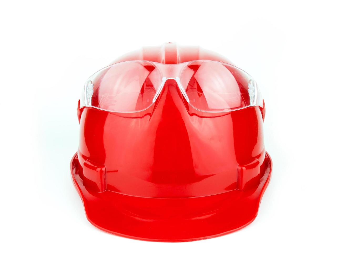 Helm- und Schutzbrillenkonstruktion isoliert auf weißem Hintergrund foto
