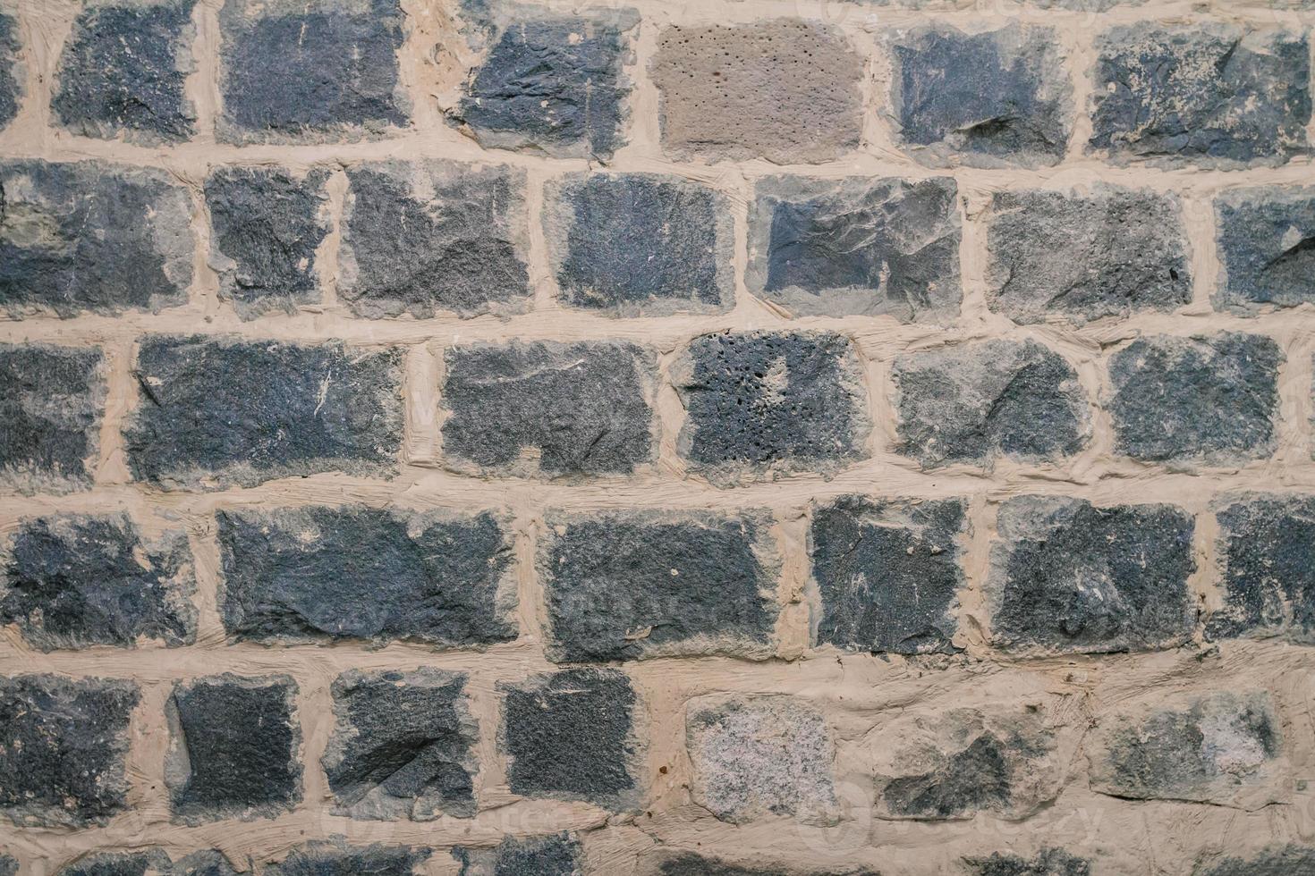 Textur der schwarzen Basaltmauer foto