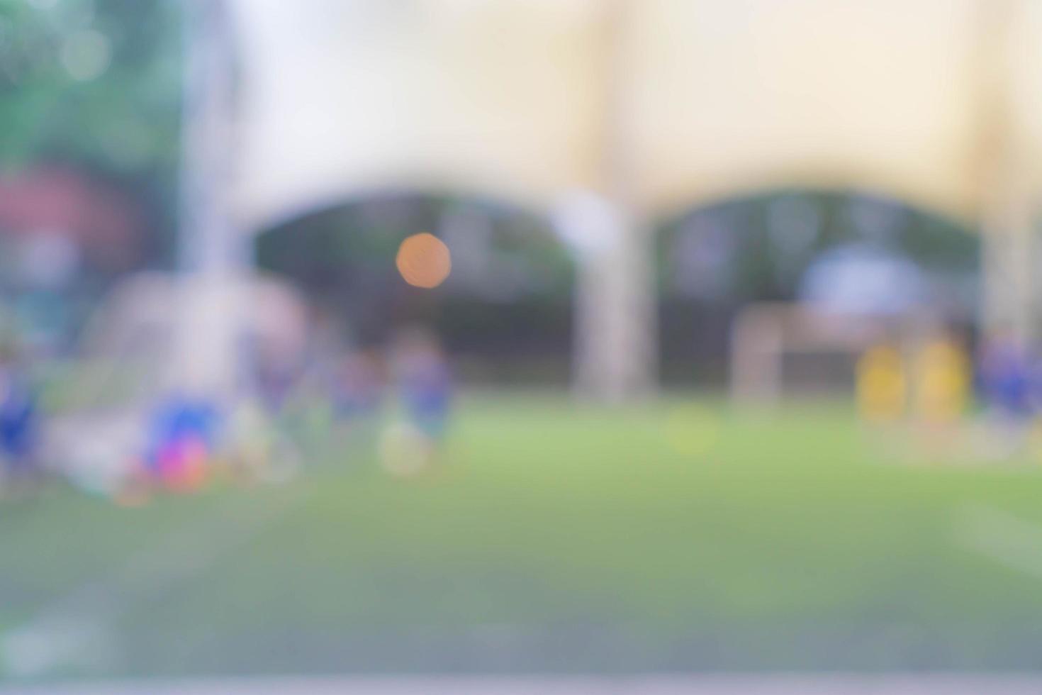 abstrakter verschwommener Fußballplatz foto