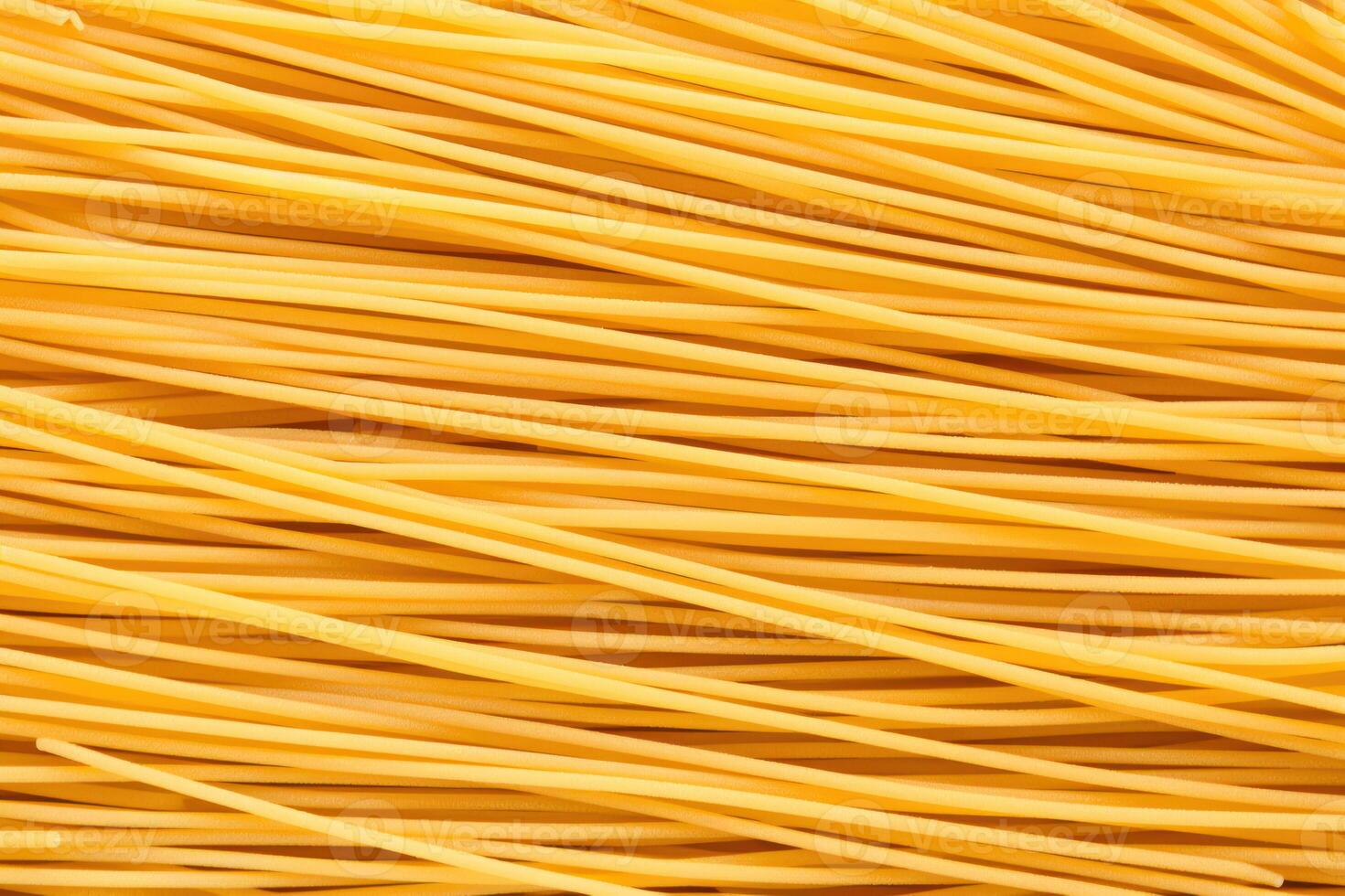ai generiert roh Spaghetti Pasta wie Hintergrund, oben Aussicht foto
