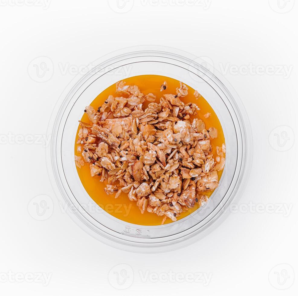 Chia Pudding mit Mango und Granola oben Aussicht foto