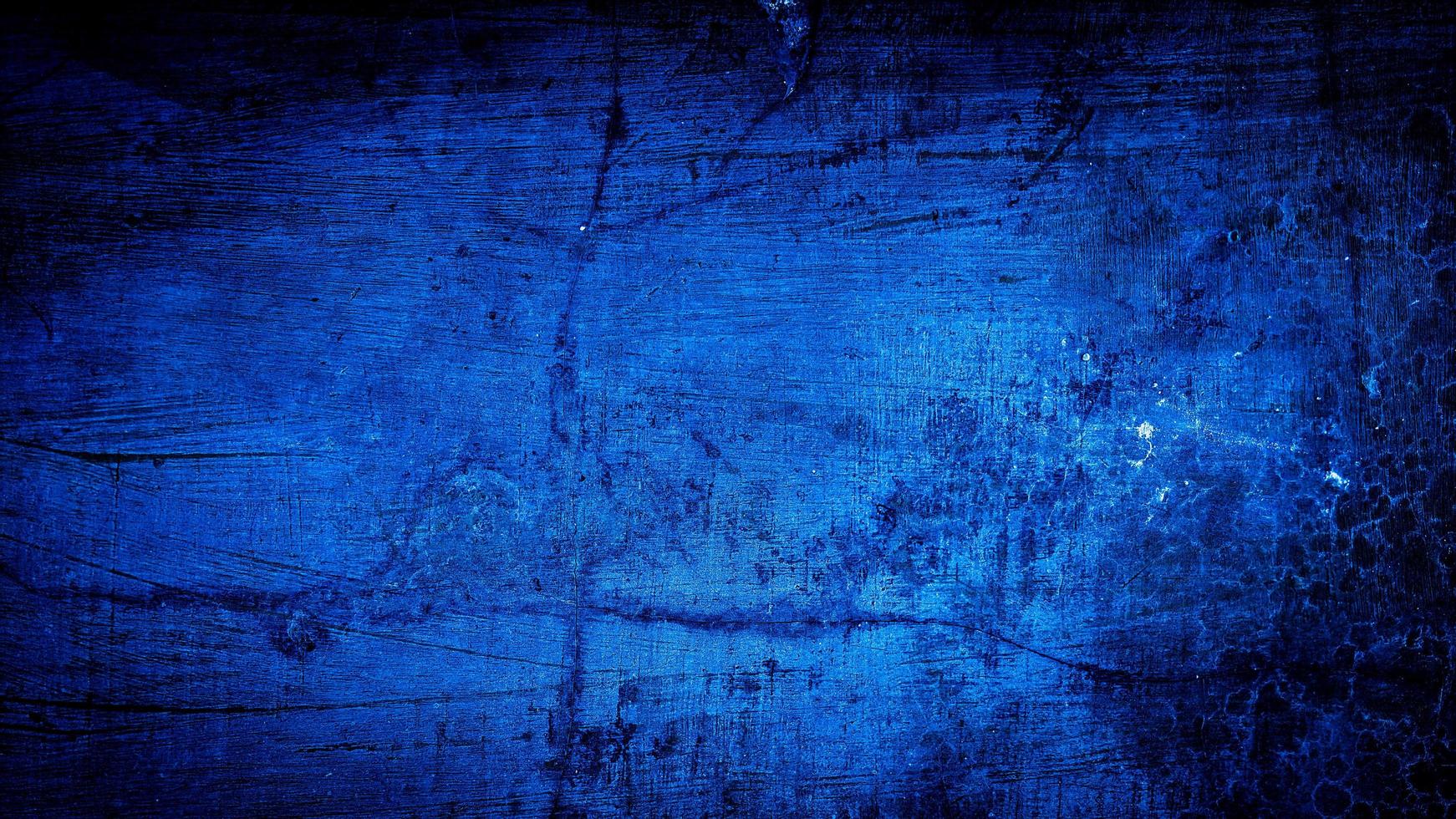 Grunge-Hintergrund der alten blauen Wand. abstrakter Hintergrund. Blauer Hintergrund foto