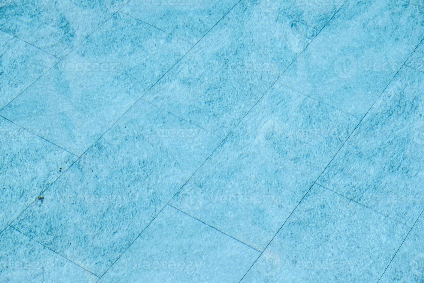 Blau Fliesen Textur im das Schwimmen Schwimmbad. foto