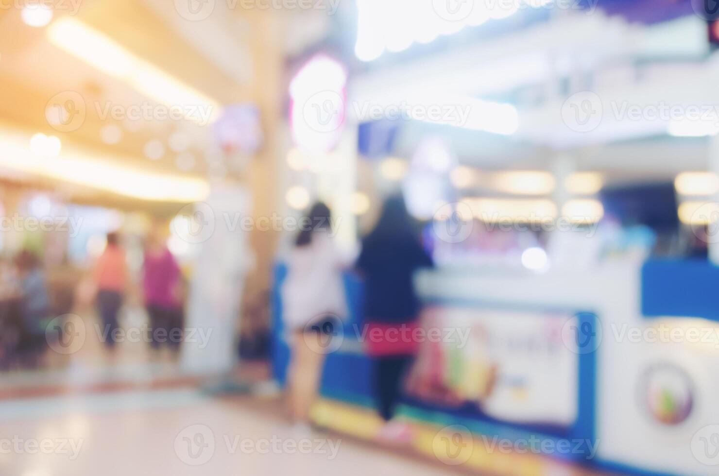 verschwommen Bild von Einkaufen Einkaufszentrum und Menschen zum Hintergrund foto