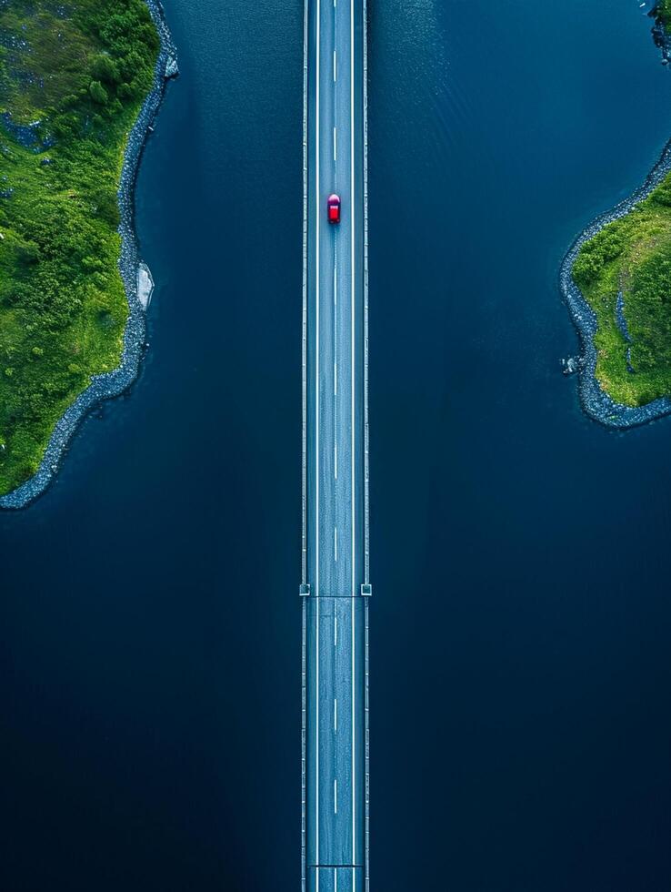 ai generiert Antenne Aussicht erfasst lange Brücke Das erstreckt sich über dunkel Blau Körper von Wasser ai generiert foto