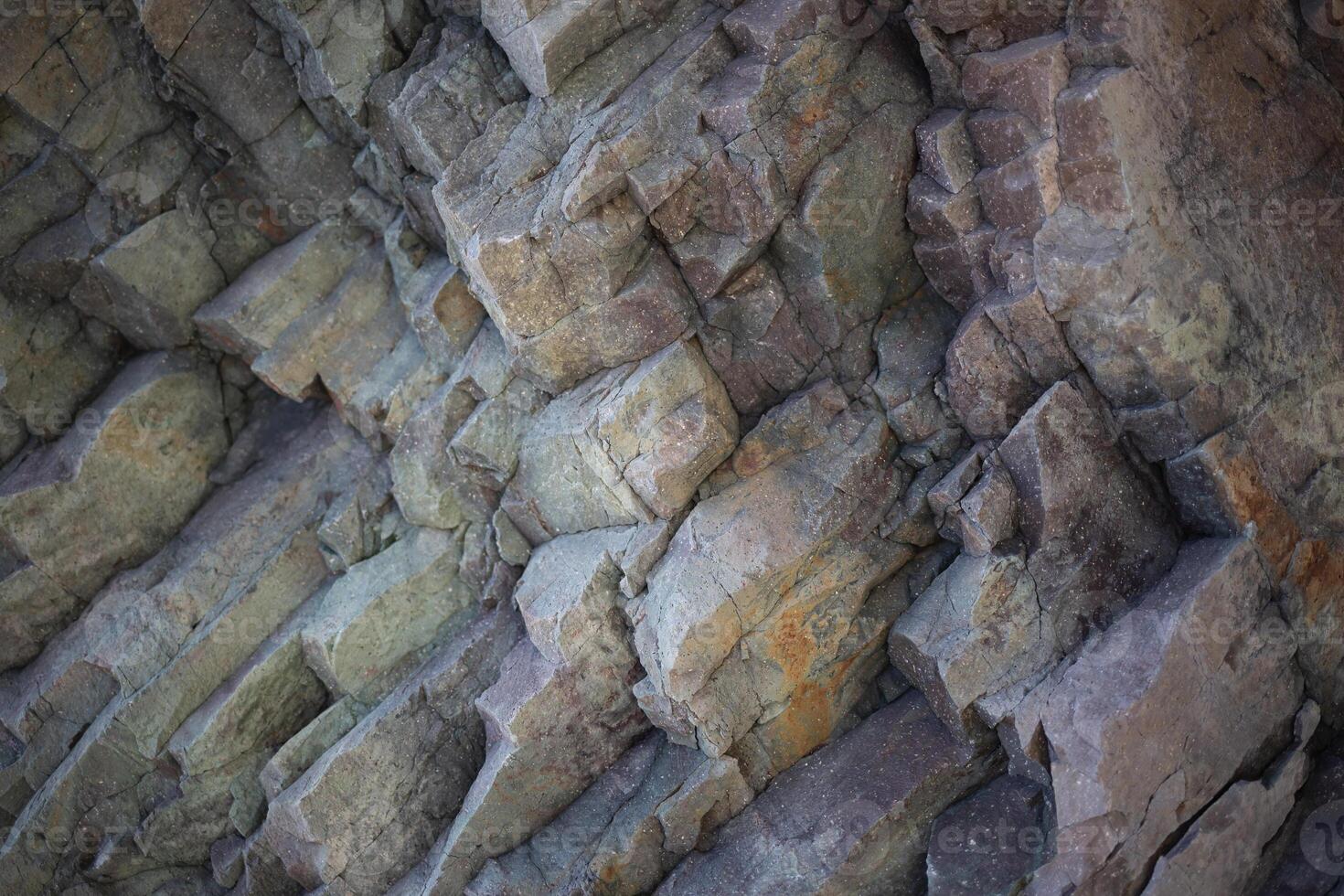 schön ungewöhnlich Textur von Stein Felsen. großartig Hintergrund zum Design foto