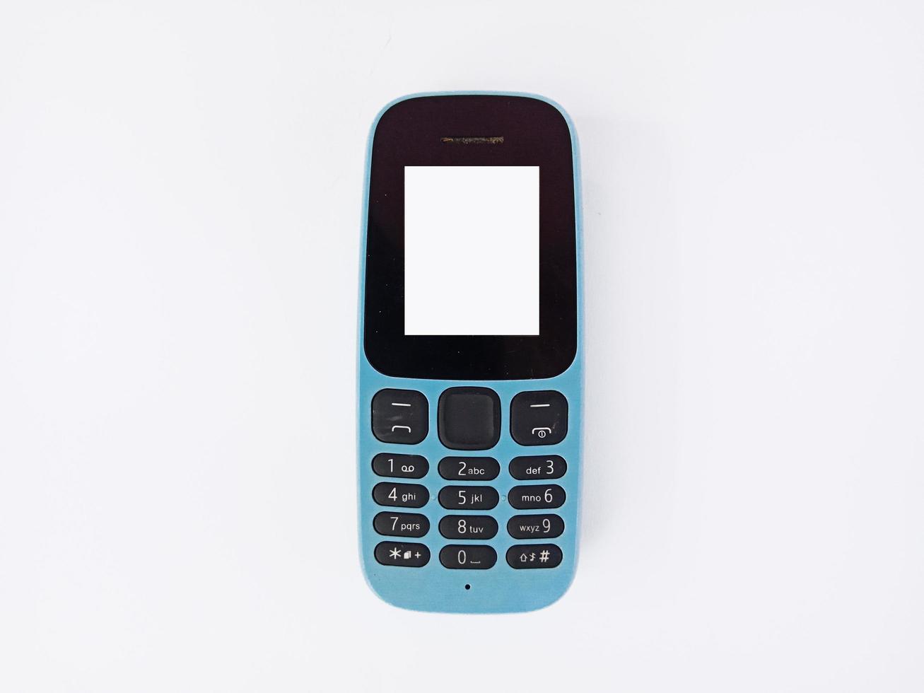 Draufsicht Landschaft, altes Telefon isoliert auf weißem Hintergrund foto