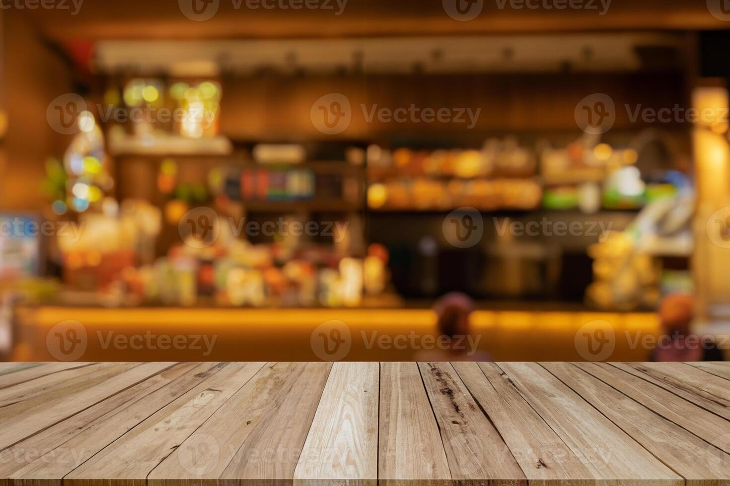 Bild von hölzern Tabelle im Vorderseite von abstrakt verschwommen Hintergrund von Kaffee Geschäft Lichter.Unschärfe Kaffee Geschäft oder Cafe Restaurant mit abstrakt Bokeh Licht Hintergrund. foto