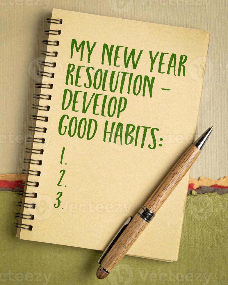 meine Neu Jahr Auflösung - - sich entwickeln gut Gewohnheiten, Handschrift im ein Spiral- Notizbuch foto