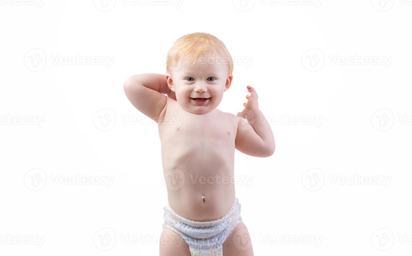 ein ein Jahr alt Baby im Windeln auf ein Weiß Hintergrund lächelt und sieht aus beim das Kamera. foto